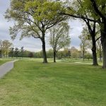 Panoramic view of a lush green golf course at Hendricks Field Golf Course. Smooth