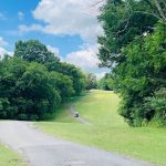 Panoramic view of a lush green golf course at Henry Horton Golf Course. Smooth