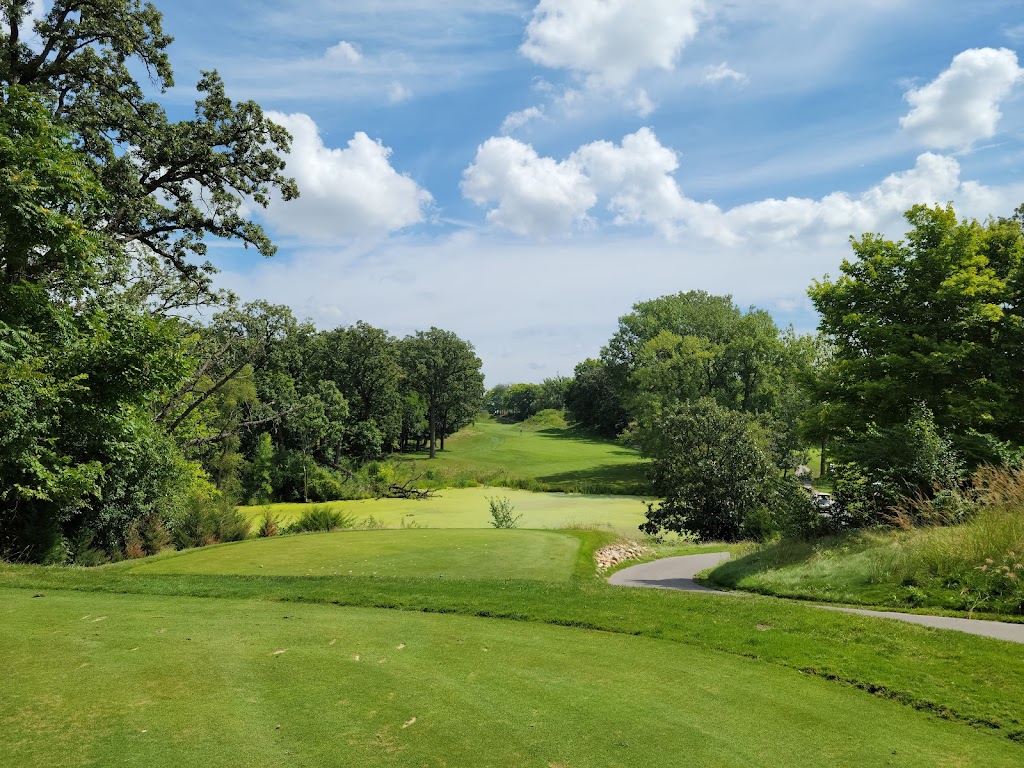Panoramic view of a lush green golf course at Heritage Bluffs Golf Club. Smooth