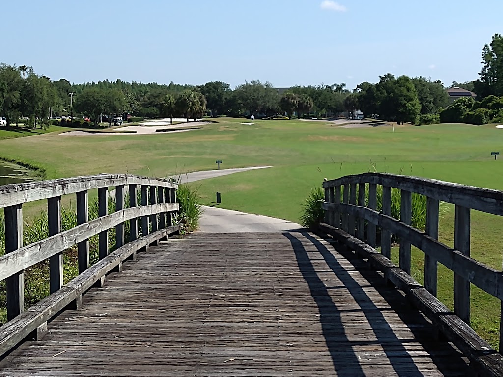 Panoramic view of a lush green golf course at Heritage Isles Golf & Country Club. Smooth