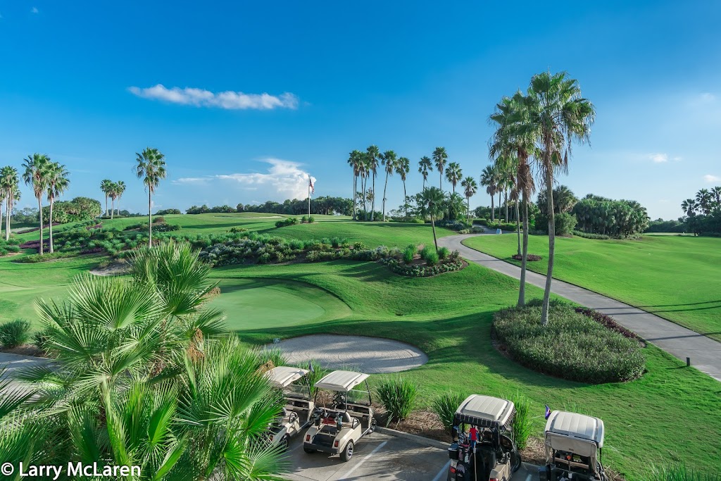 Panoramic view of a lush green golf course at Heron Creek Golf & Country Club. Smooth