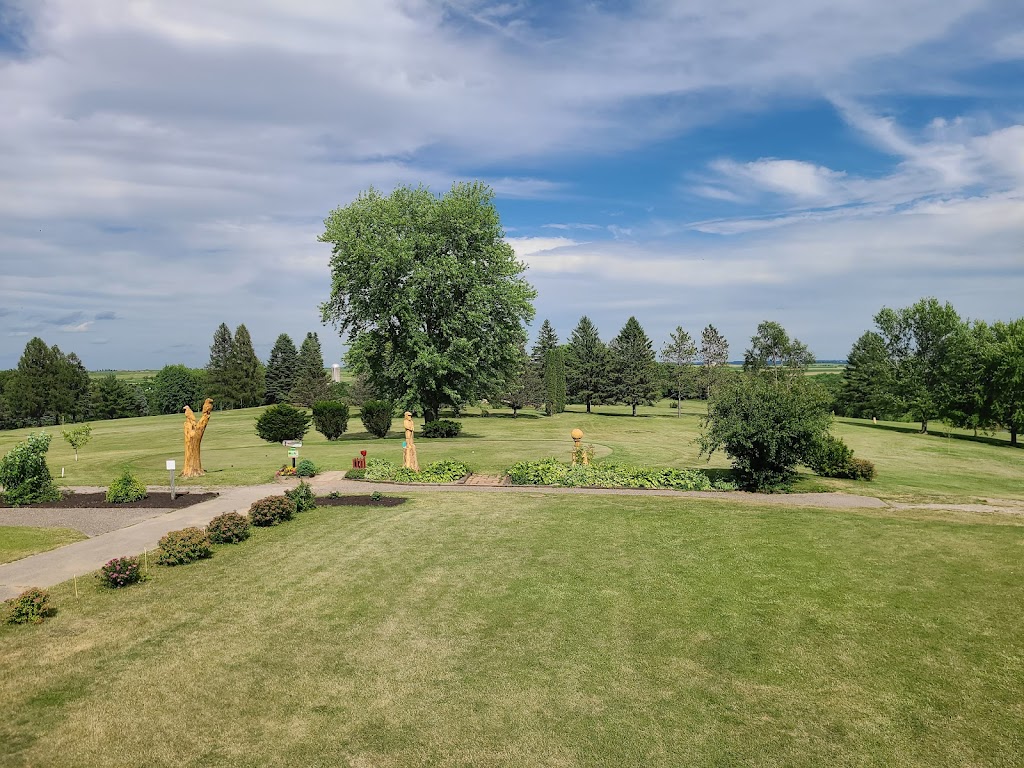 Panoramic view of a lush green golf course at Hickory Grove Golf & Country Club. Smooth