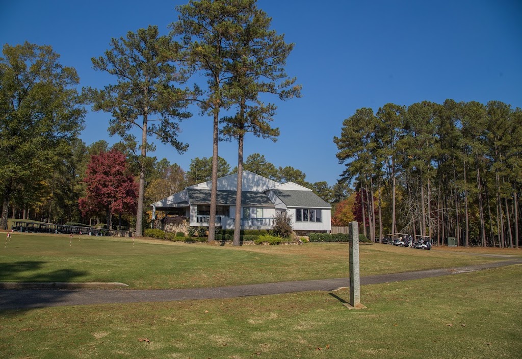 Panoramic view of a lush green golf course at Hickory Knob Golf Course. Smooth