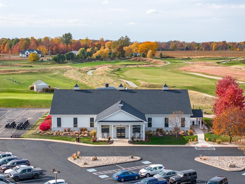 Panoramic view of a lush green golf course at Hickory Stick Golf Club. Smooth