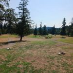 Panoramic view of a lush green golf course at Hidden Valley Golf Course. Smooth