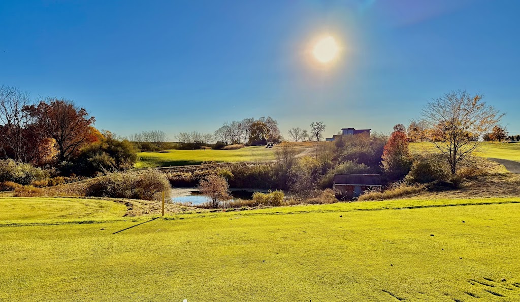 Panoramic view of a lush green golf course at High Bridge Hills Golf Club. Smooth