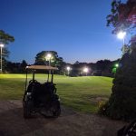 Panoramic view of a lush green golf course at Highland Greens Golf Course. Smooth