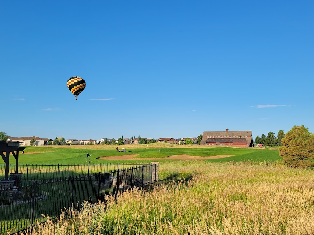 Panoramic view of a lush green golf course at Highland Meadows Golf Course. Smooth