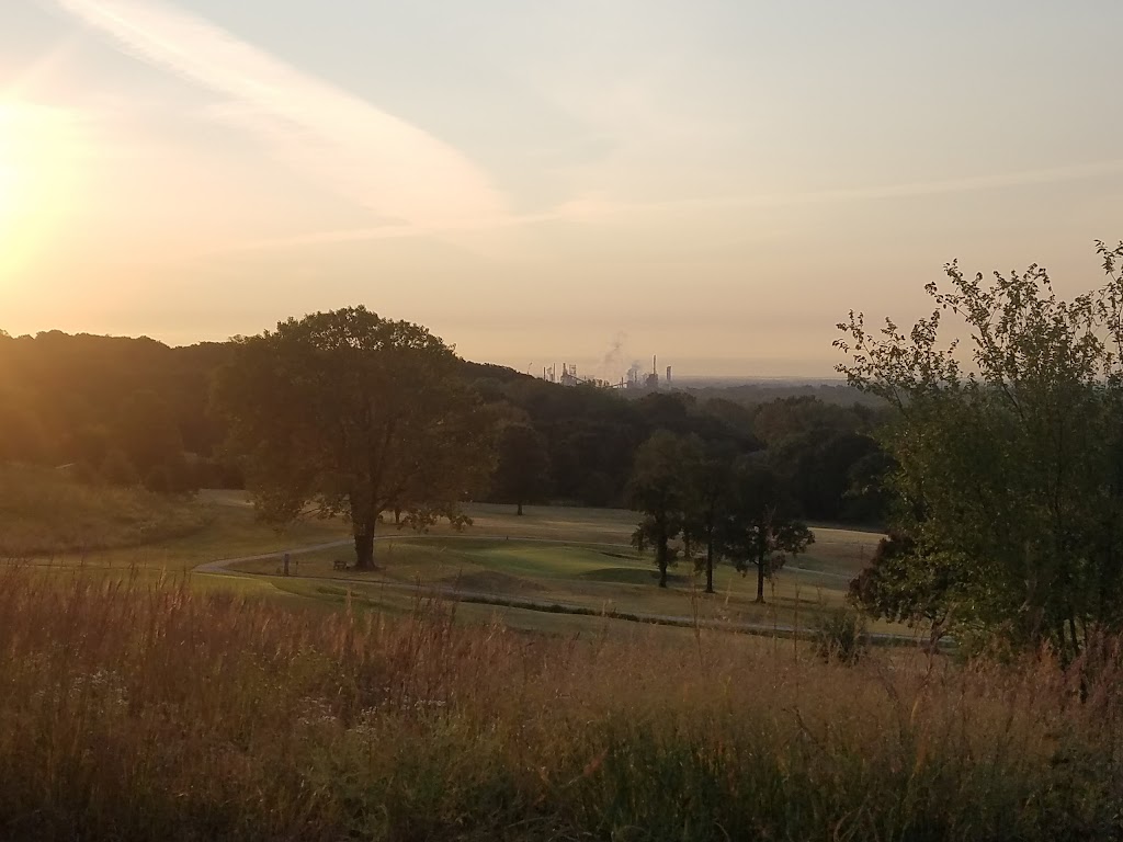 Panoramic view of a lush green golf course at Hillcrest Golf Course. Smooth