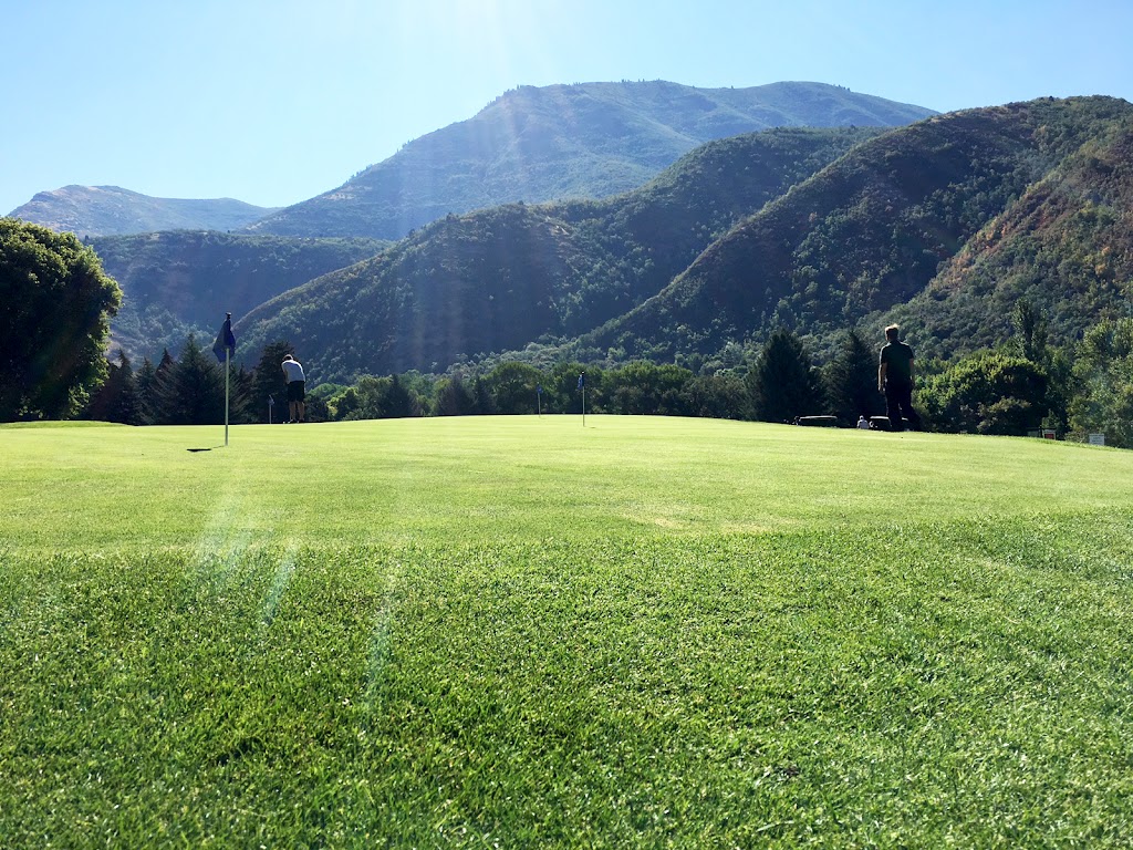 Panoramic view of a lush green golf course at Hobble Creek Golf Course. Smooth