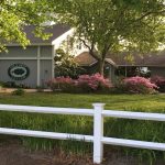 Panoramic view of a lush green golf course at Holly Ridge Golf Club. Smooth