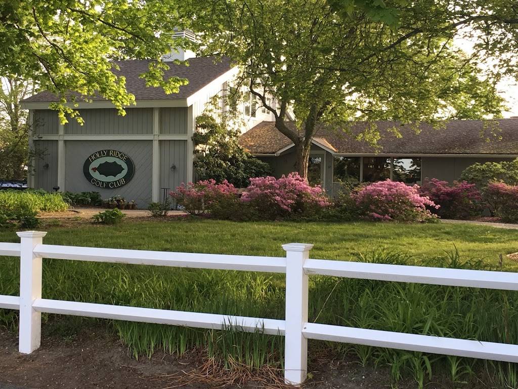 Panoramic view of a lush green golf course at Holly Ridge Golf Club. Smooth