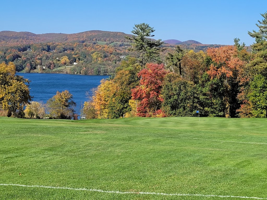 Panoramic view of a lush green golf course at Hotchkiss School Golf Course. Smooth