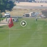 green grass with the flag in the hole.