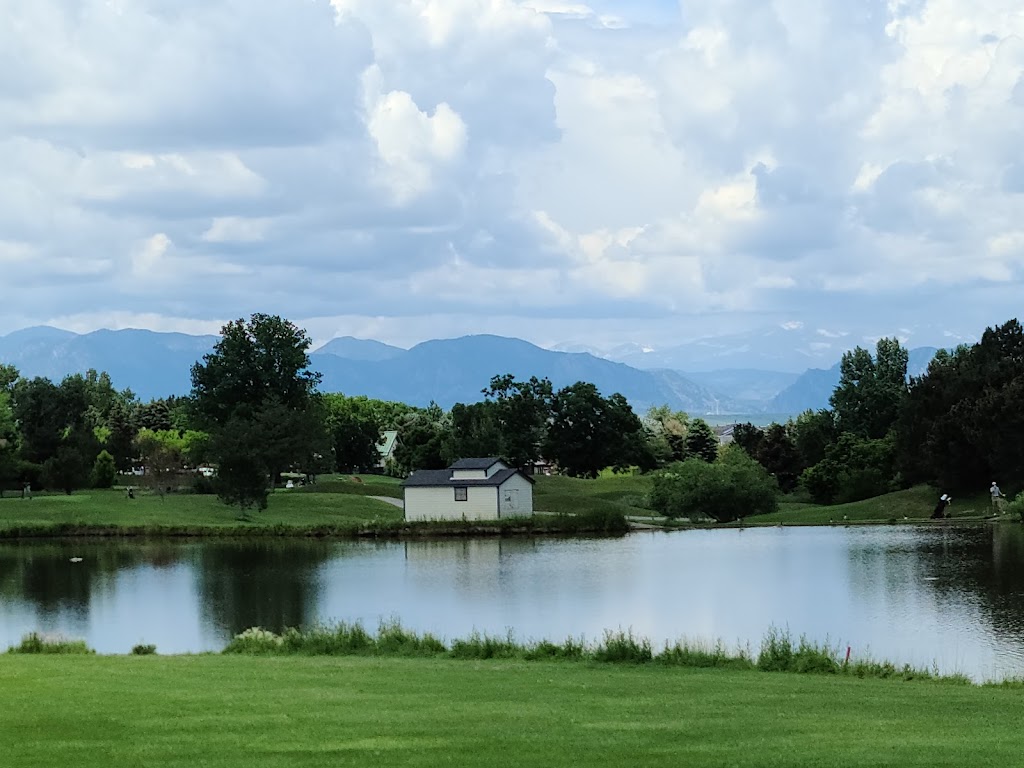 Panoramic view of a lush green golf course at Hyland Hills Golf Course. Smooth