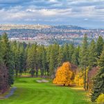 Panoramic view of a lush green golf course at Indian Canyon Golf Course. Smooth
