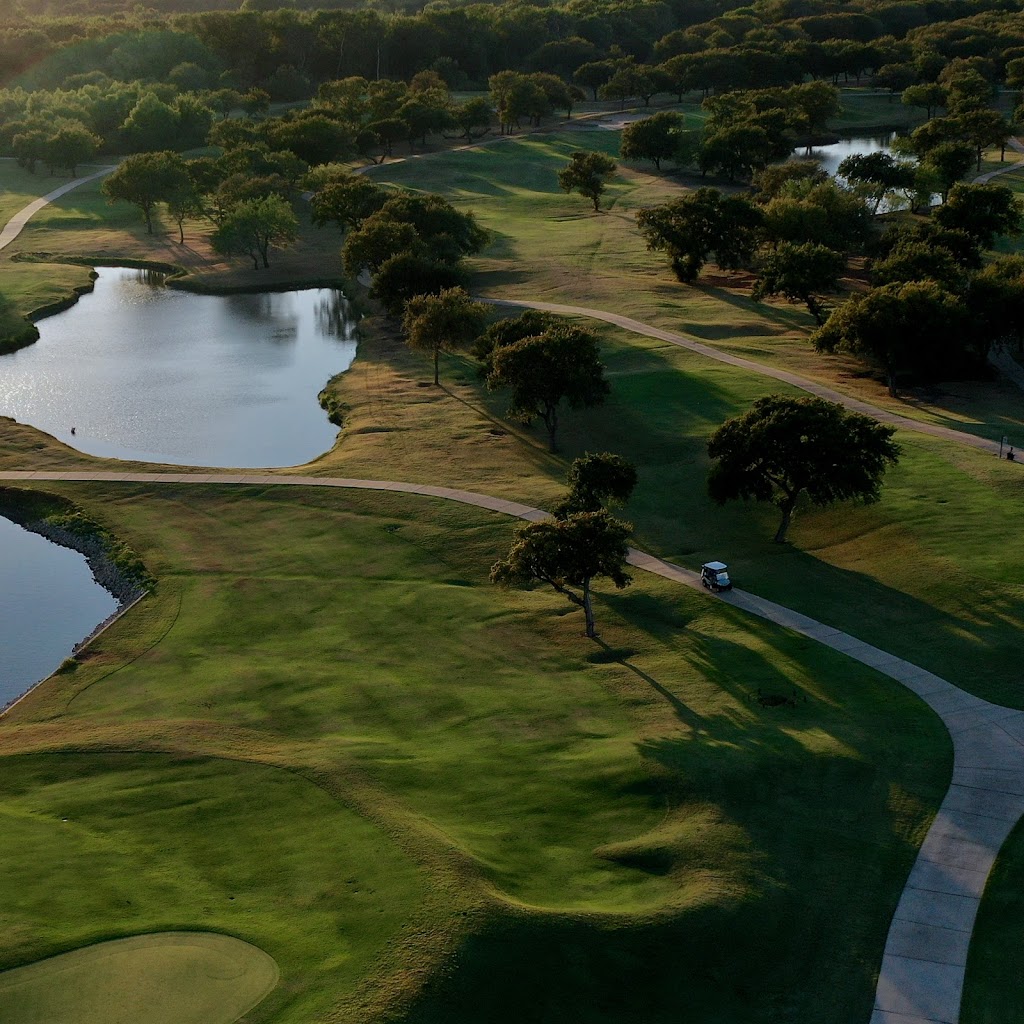 Panoramic view of a lush green golf course at Indian Creek Golf Club. Smooth