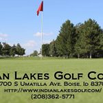 Panoramic view of a lush green golf course at Indian Lakes Golf Club. Smooth