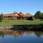 Panoramic view of a lush green golf course at Indian Tree Golf Club. Smooth