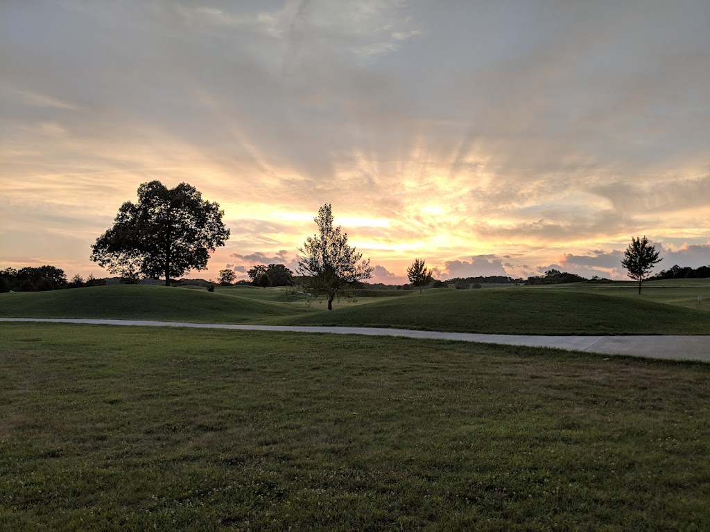 Panoramic view of a lush green golf course at Indian Tree Golf Club. Smooth