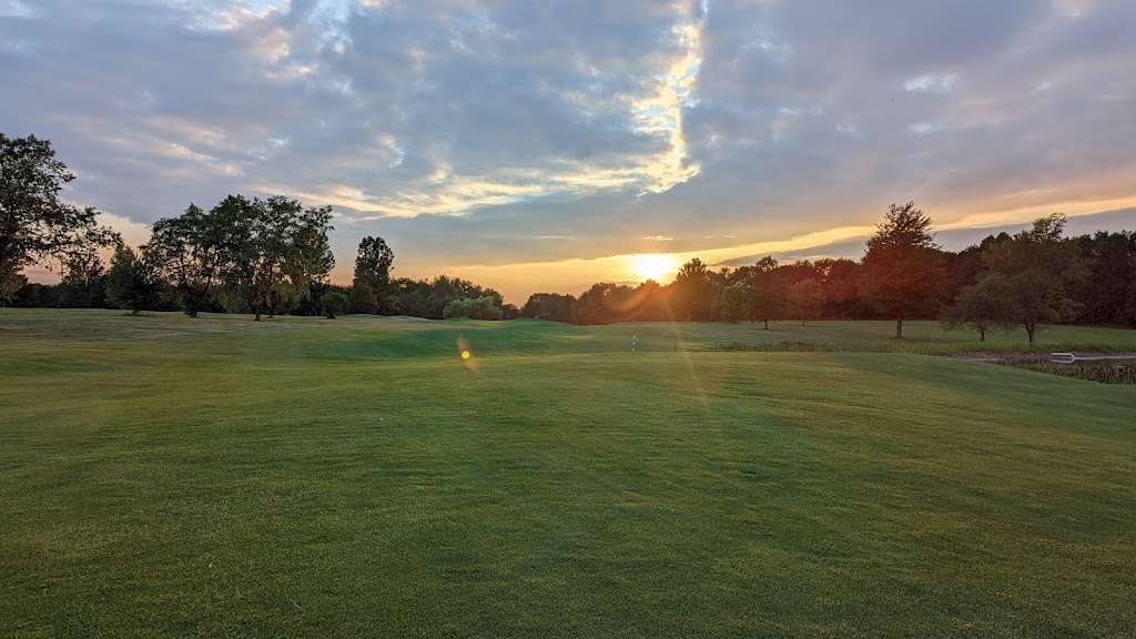Panoramic view of a lush green golf course at Indianhead Golf Course. Smooth