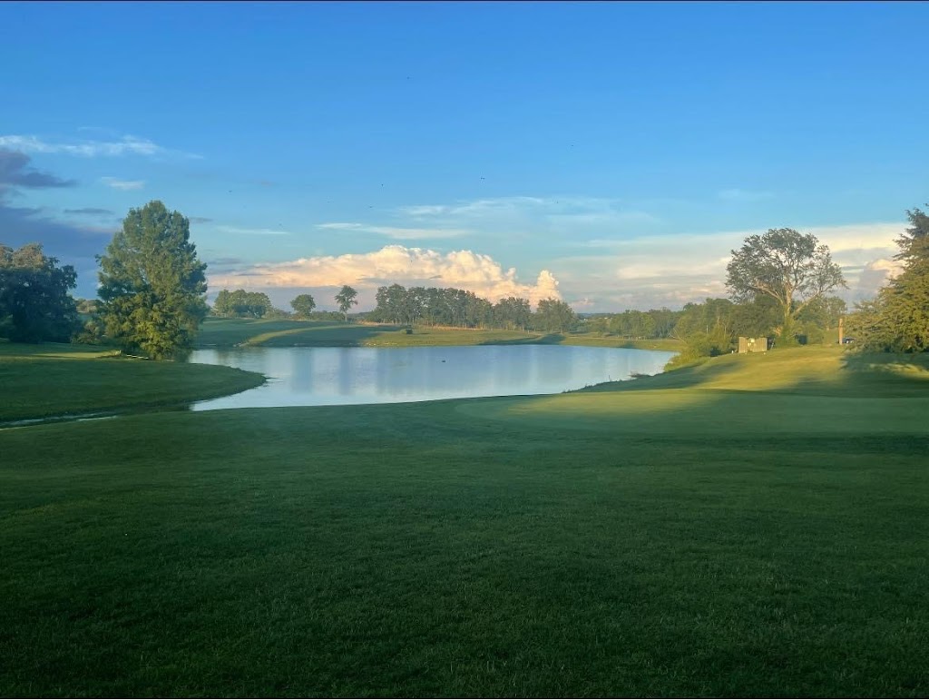 Panoramic view of a lush green golf course at Irish Hills Restaurant & Golf Club. Smooth