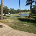 Panoramic view of a lush green golf course at Isabella Golf Course. Smooth