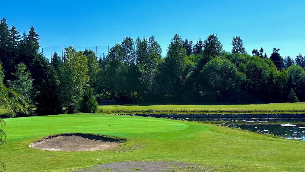 Panoramic view of a lush green golf course at Jackson Park Golf Course. Smooth