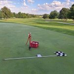 Panoramic view of a lush green golf course at Jester Park Golf Course. Smooth