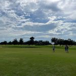 Panoramic view of a lush green golf course at Joseph M. Bartholomew Municipal Golf Course. Smooth
