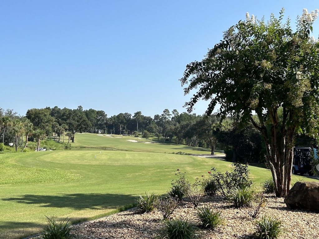 Panoramic view of a lush green golf course at Juliette Falls Golf Course and Community. Smooth