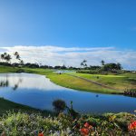 Panoramic view of a lush green golf course at Kapolei Golf Club. Smooth