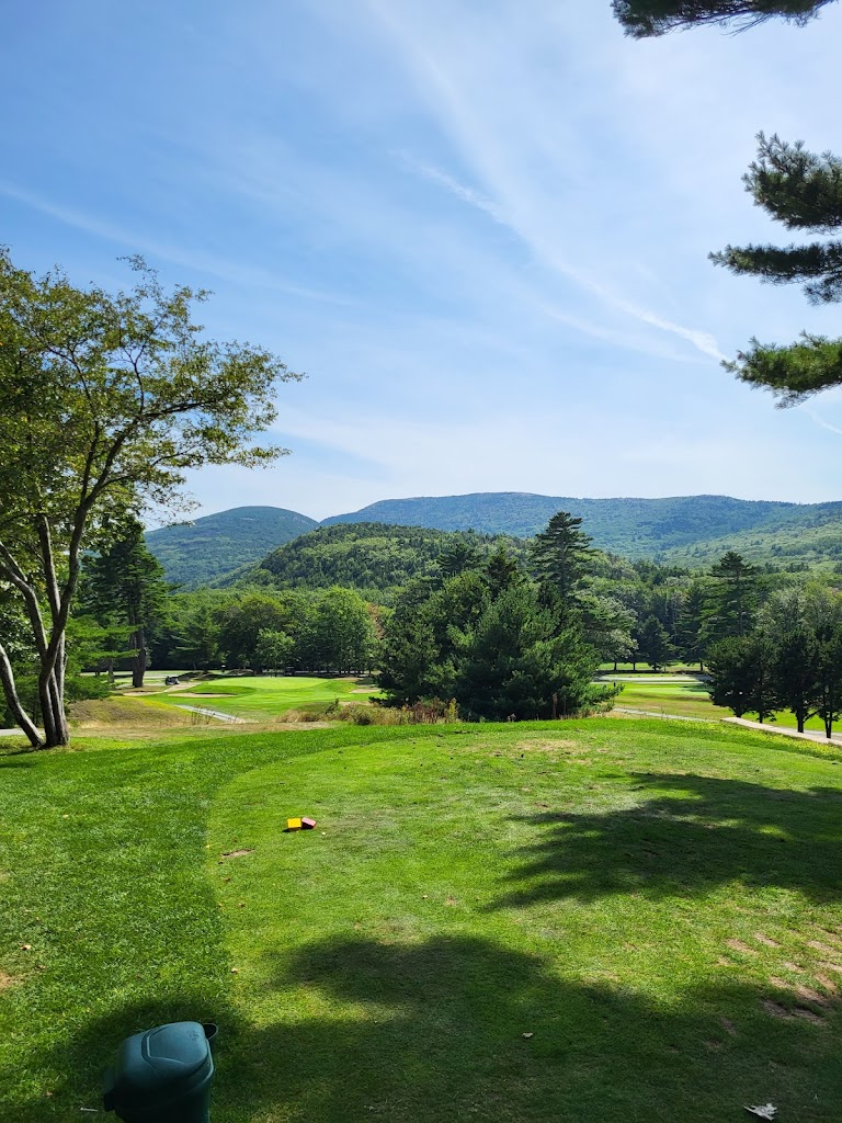Panoramic view of a lush green golf course at Kebo Valley Club. Smooth