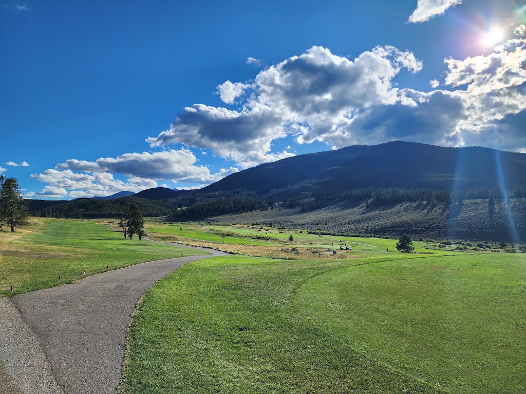 Panoramic view of a lush green golf course at Keystone Ranch Golf Course. Smooth