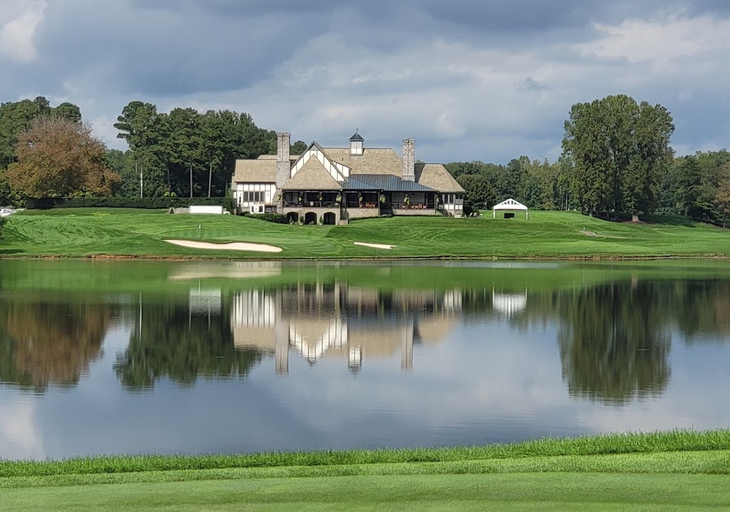 Panoramic view of a lush green golf course at Kinloch Golf Club. Smooth