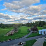 Panoramic view of a lush green golf course at Kirkbrae Country Club. Smooth