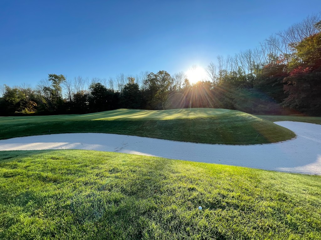 Panoramic view of a lush green golf course at Knoll Golf Club West. Smooth