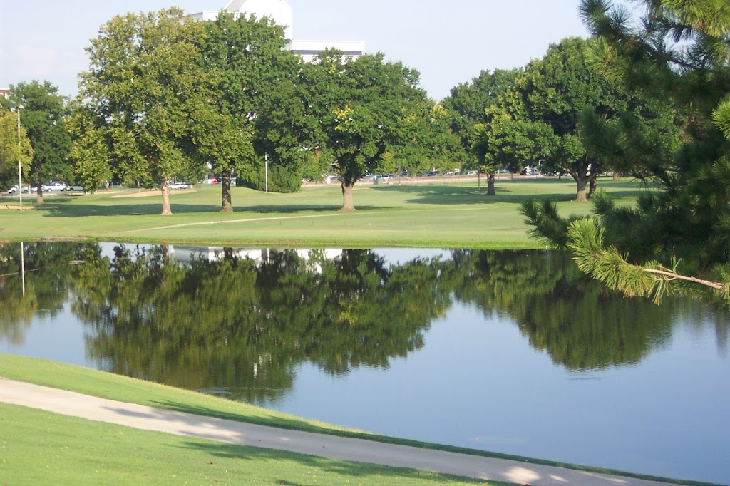 Panoramic view of a lush green golf course at LaFortune Park Golf Course. Smooth