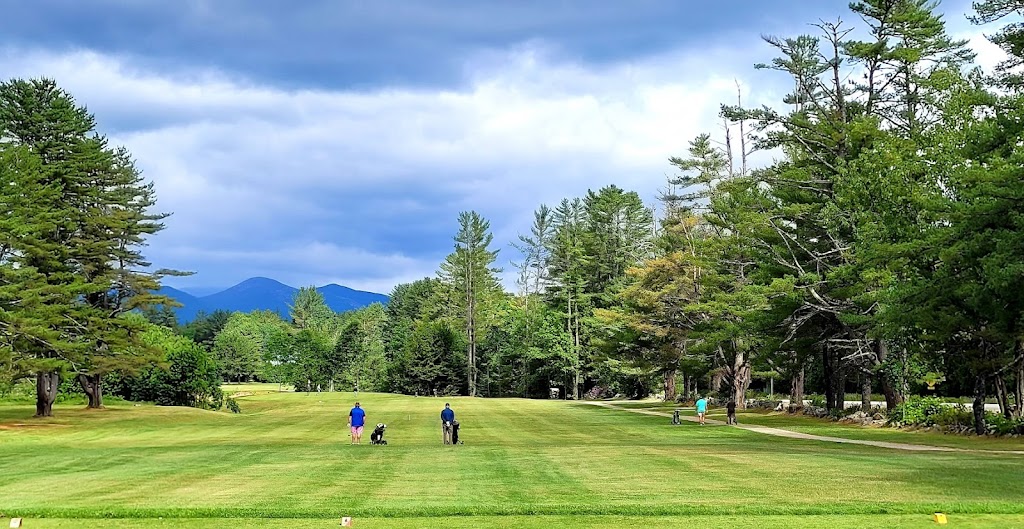 Panoramic view of a lush green golf course at Lake Kezar Country Club. Smooth
