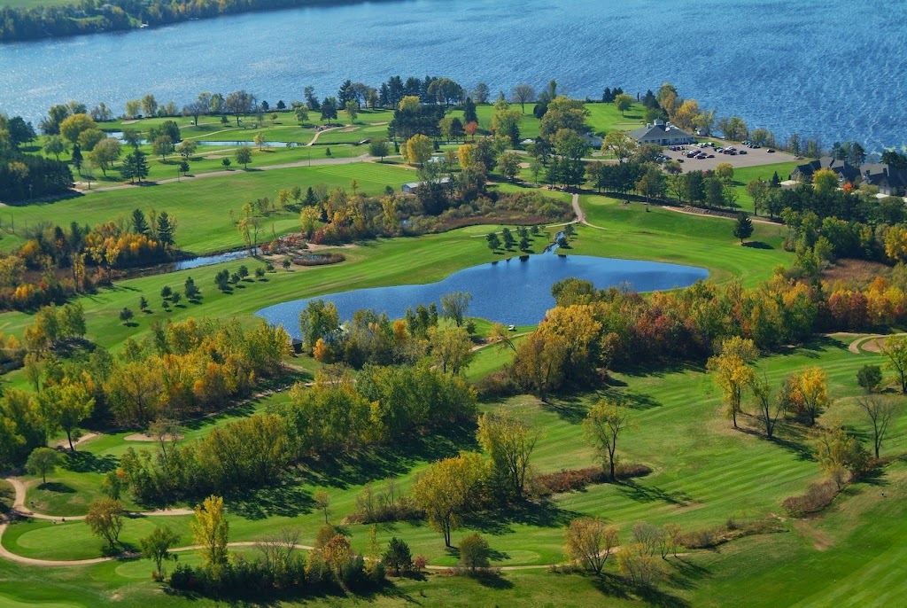 Panoramic view of a lush green golf course at Lake Wissota Golf & Events. Smooth