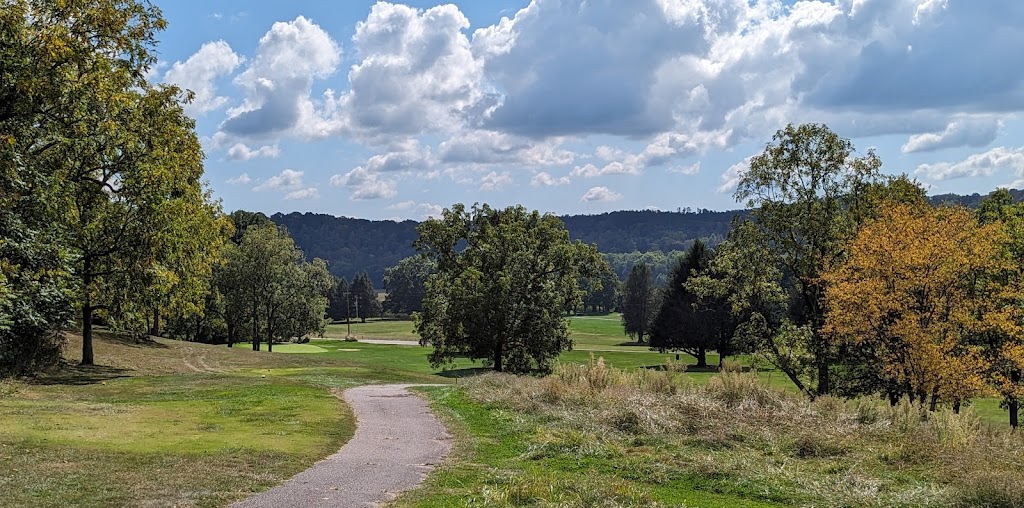 Panoramic view of a lush green golf course at Lakeside Golf Course. Smooth
