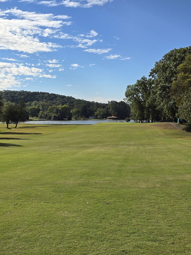 Panoramic view of a lush green golf course at Lakeside Golf Course. Smooth