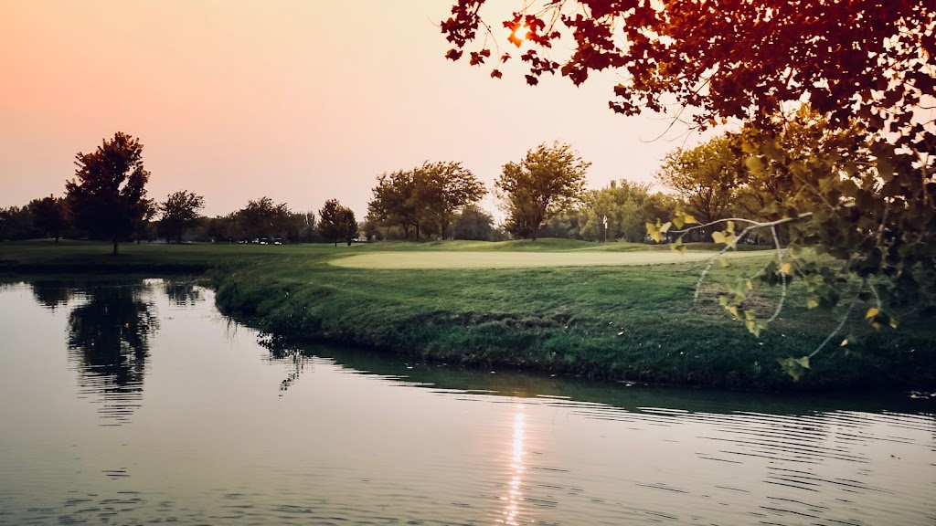 Panoramic view of a lush green golf course at Lakeside Golf Course. Smooth