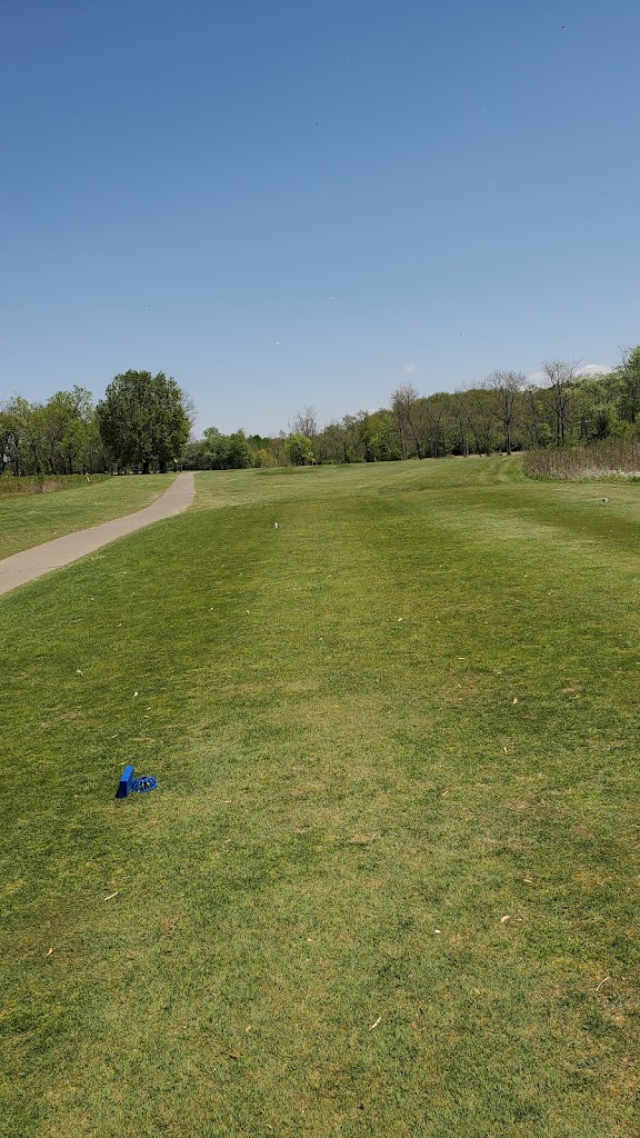 Panoramic view of a lush green golf course at Lakeside Golf Course. Smooth