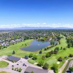 Panoramic view of a lush green golf course at Lakeview Golf Course. Smooth