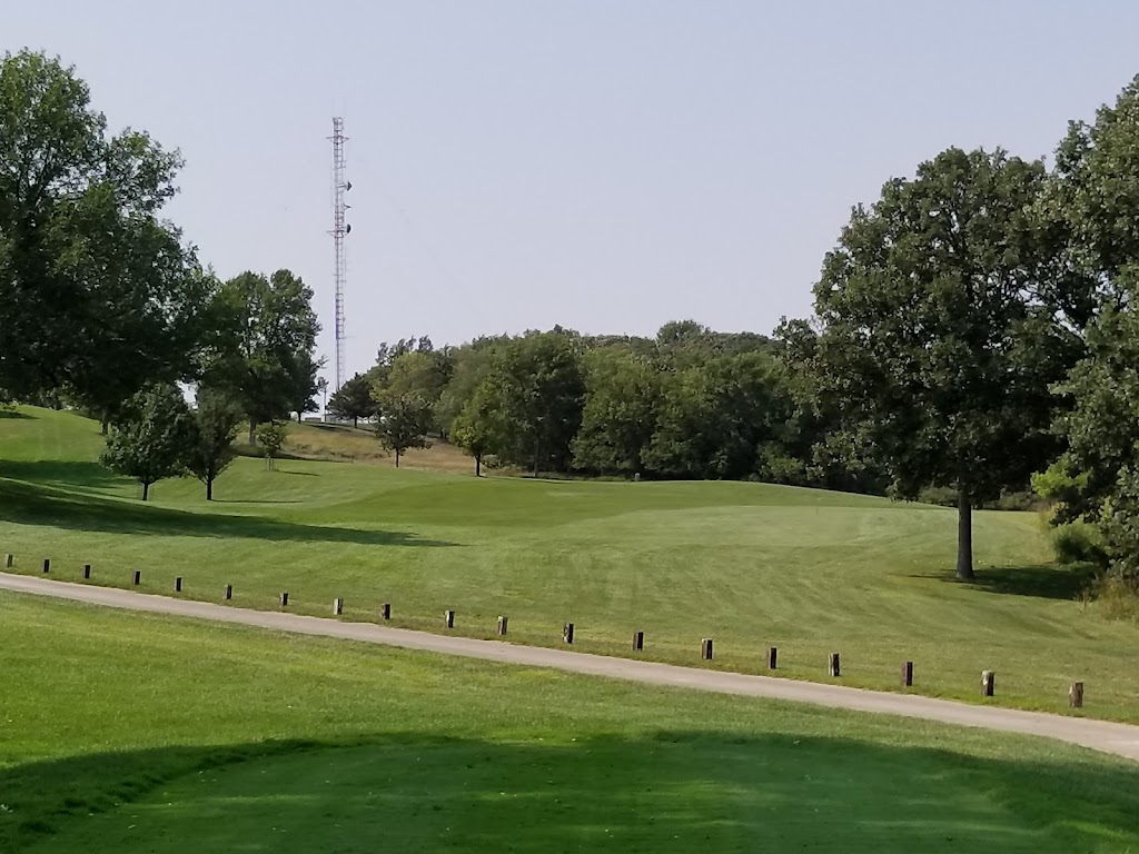 Panoramic view of a lush green golf course at Lakeview Golf Course. Smooth
