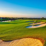 Panoramic view of a lush green golf course at Lakewood National Golf Club. Smooth