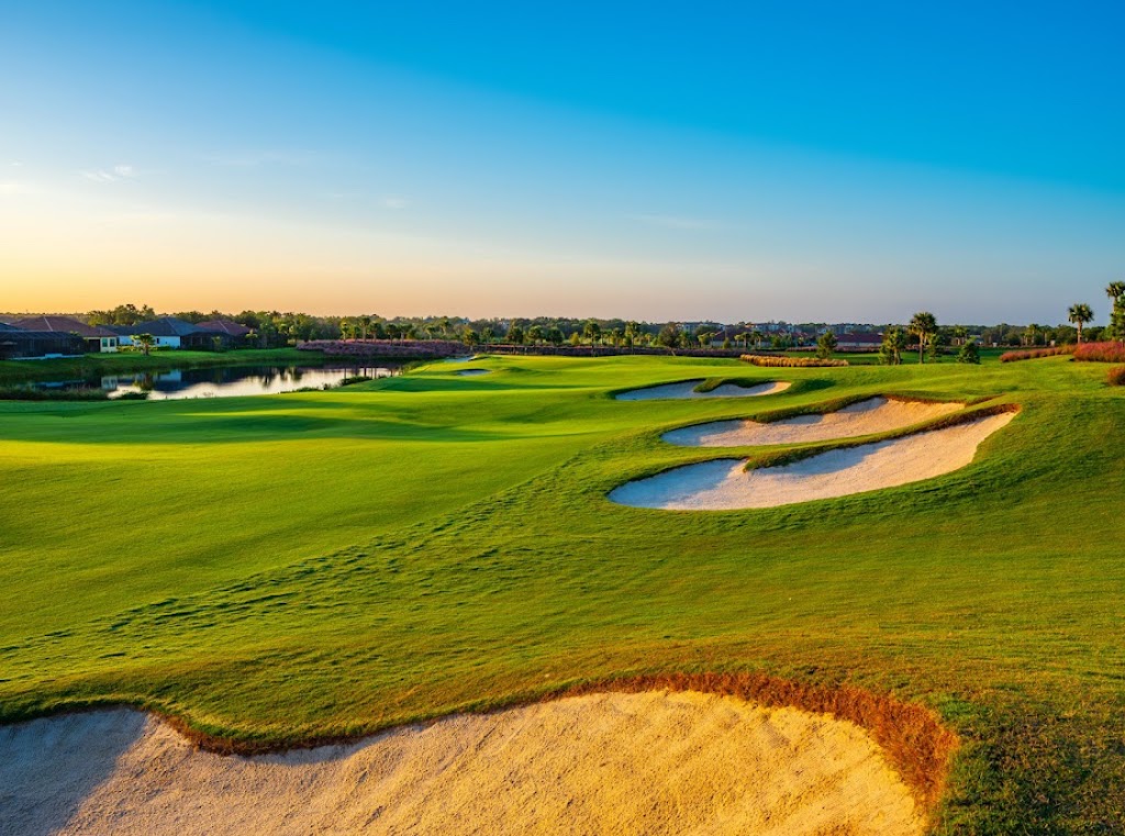 Panoramic view of a lush green golf course at Lakewood National Golf Club. Smooth