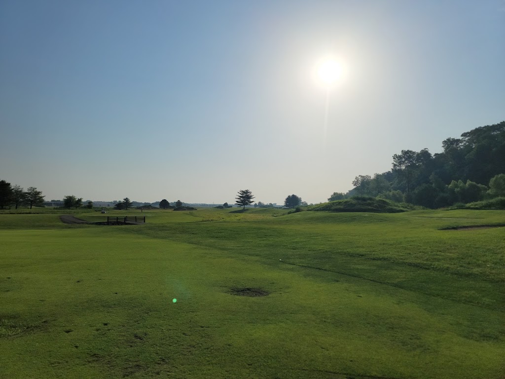 Panoramic view of a lush green golf course at Landings at Spirit Golf Club. Smooth