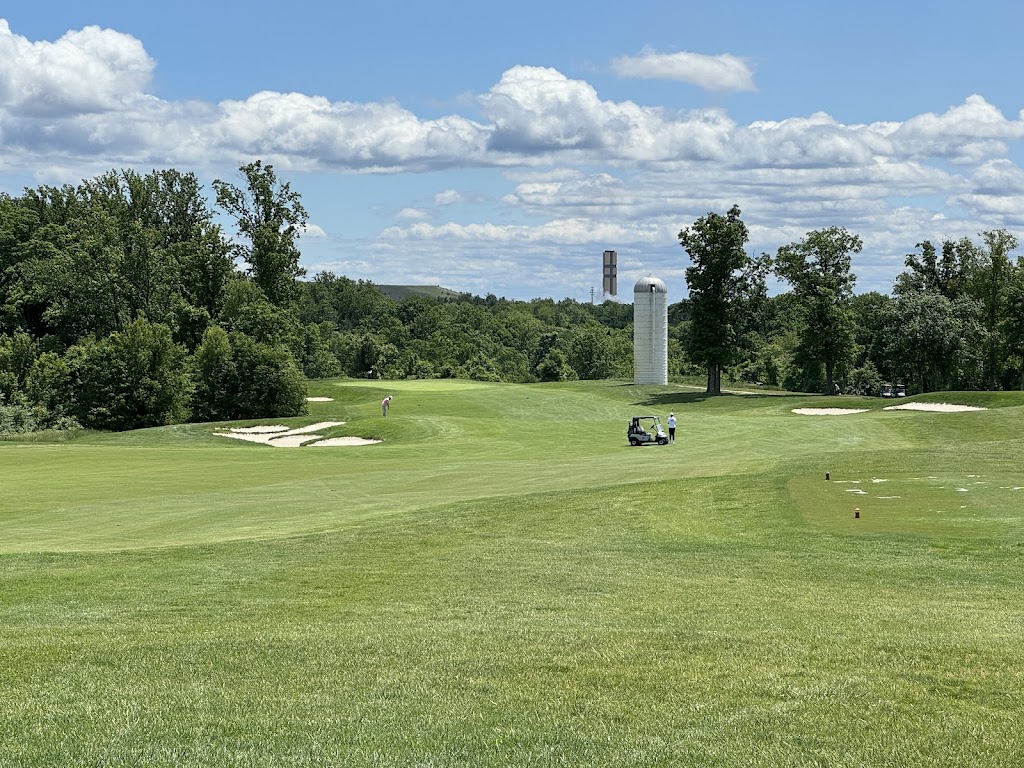 Panoramic view of a lush green golf course at Laurel Hill Golf Club. Smooth